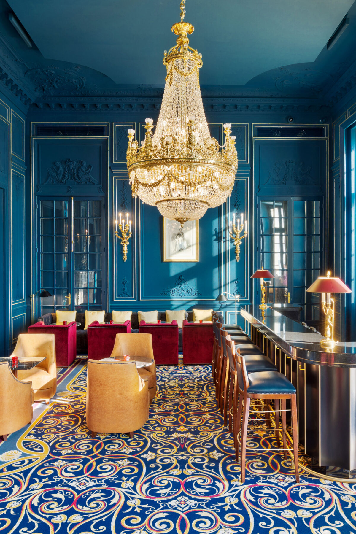 Elegant blue salon with crystal chandelier in a luxury hotel in Biarritz